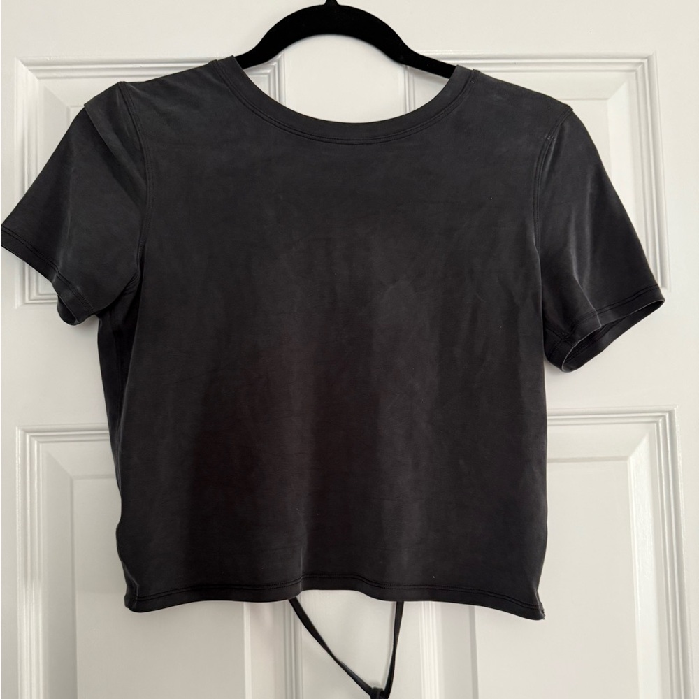LULULEMON. Black Women's Top with open back detail. Size 4